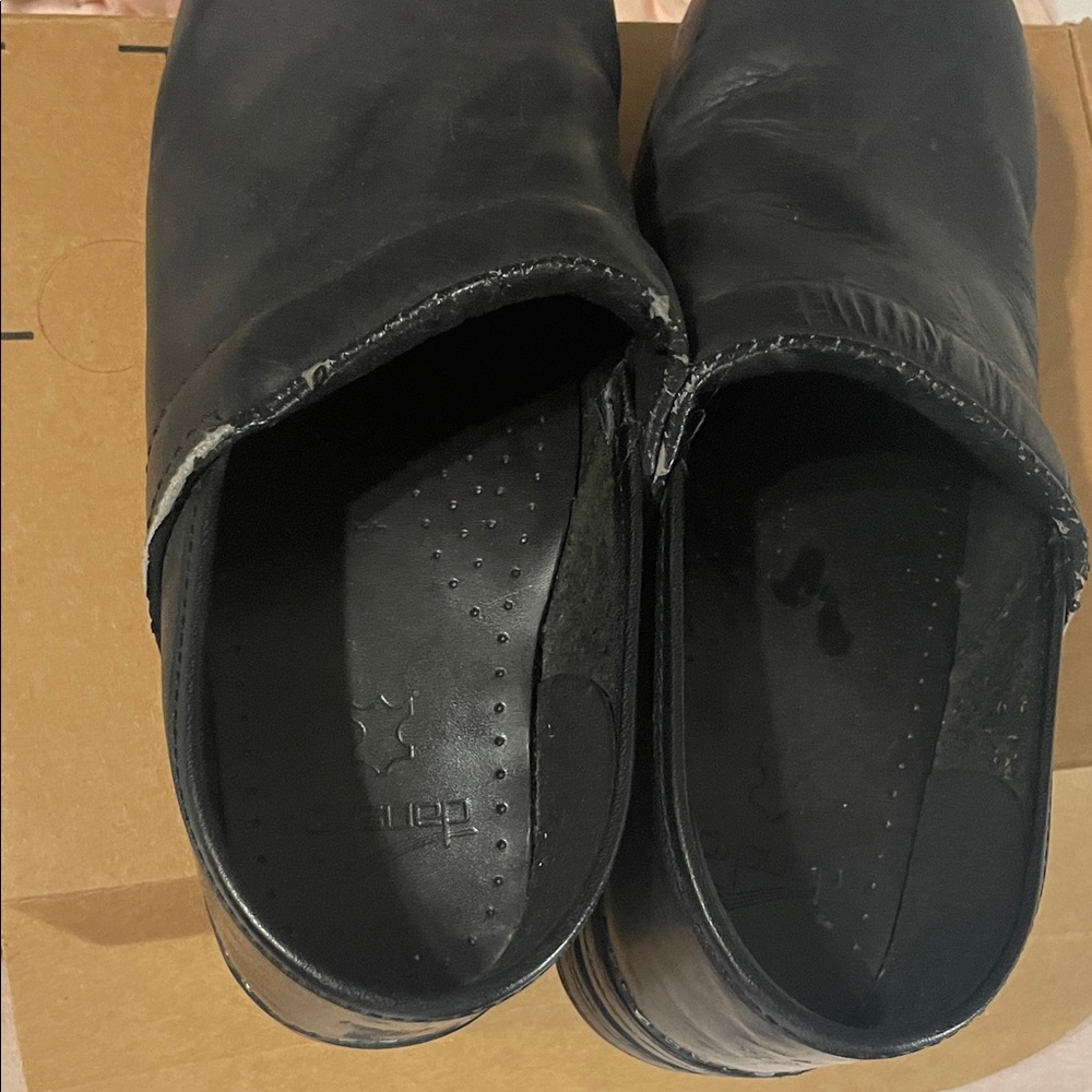 Dansko Black Leather Women's Slip-On Clogs - Picture 2 of 4